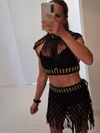 Front view of the Fénix luxury black macramé festival two-piece set by ALTYSAN with gold metallic bead details