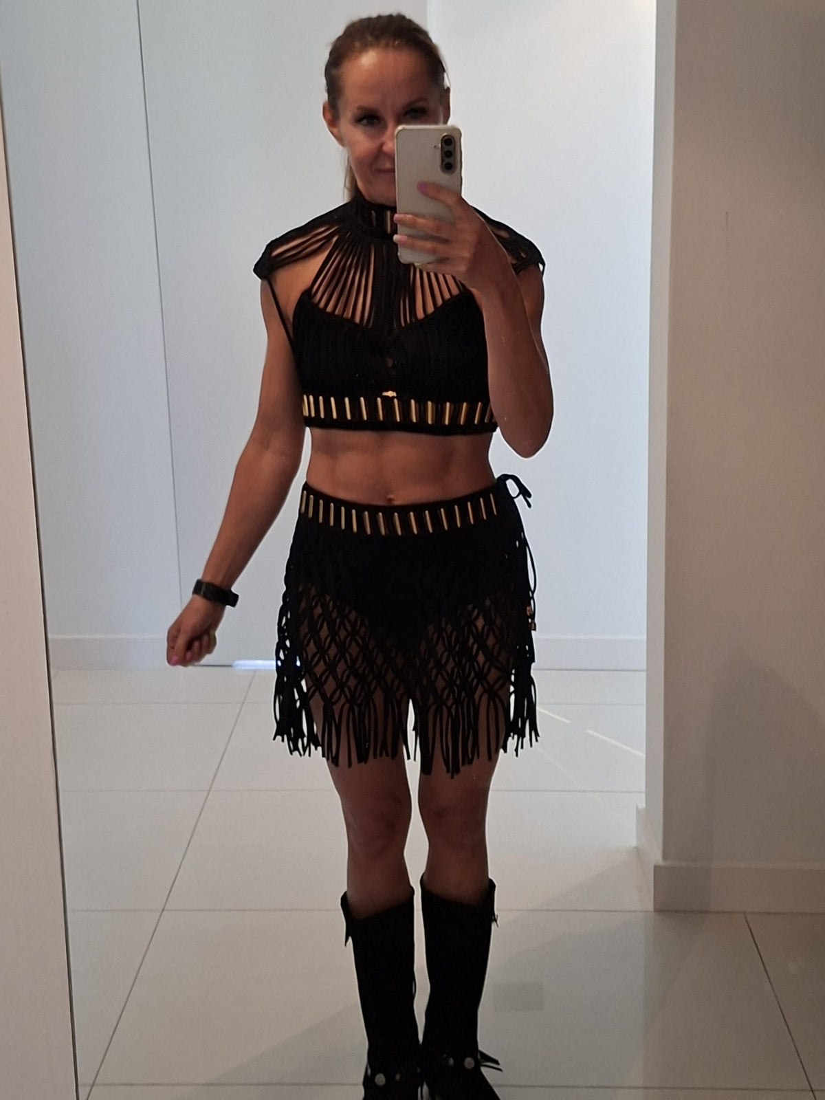 Two-piece luxury resort wear showing premium fringe movement and custom handmade knots by ALTYSAN