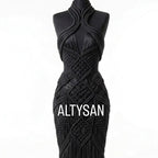 Black halter neck macrame couture gown on mannequin, neckline detail
