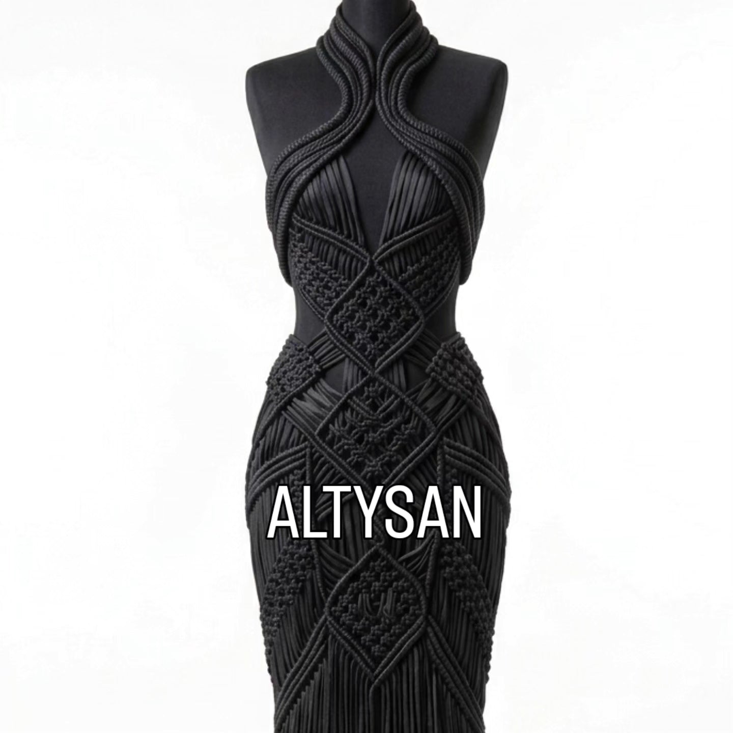 Black halter neck macrame couture gown on mannequin, neckline detail