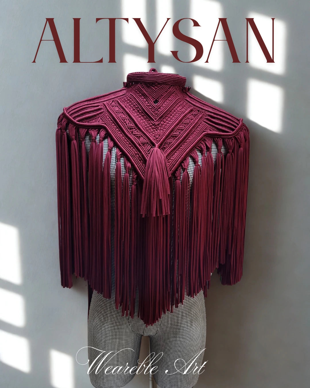 Macrame top with fringe details on a mannequin against a white wall with 'ALTYSAN' branding.