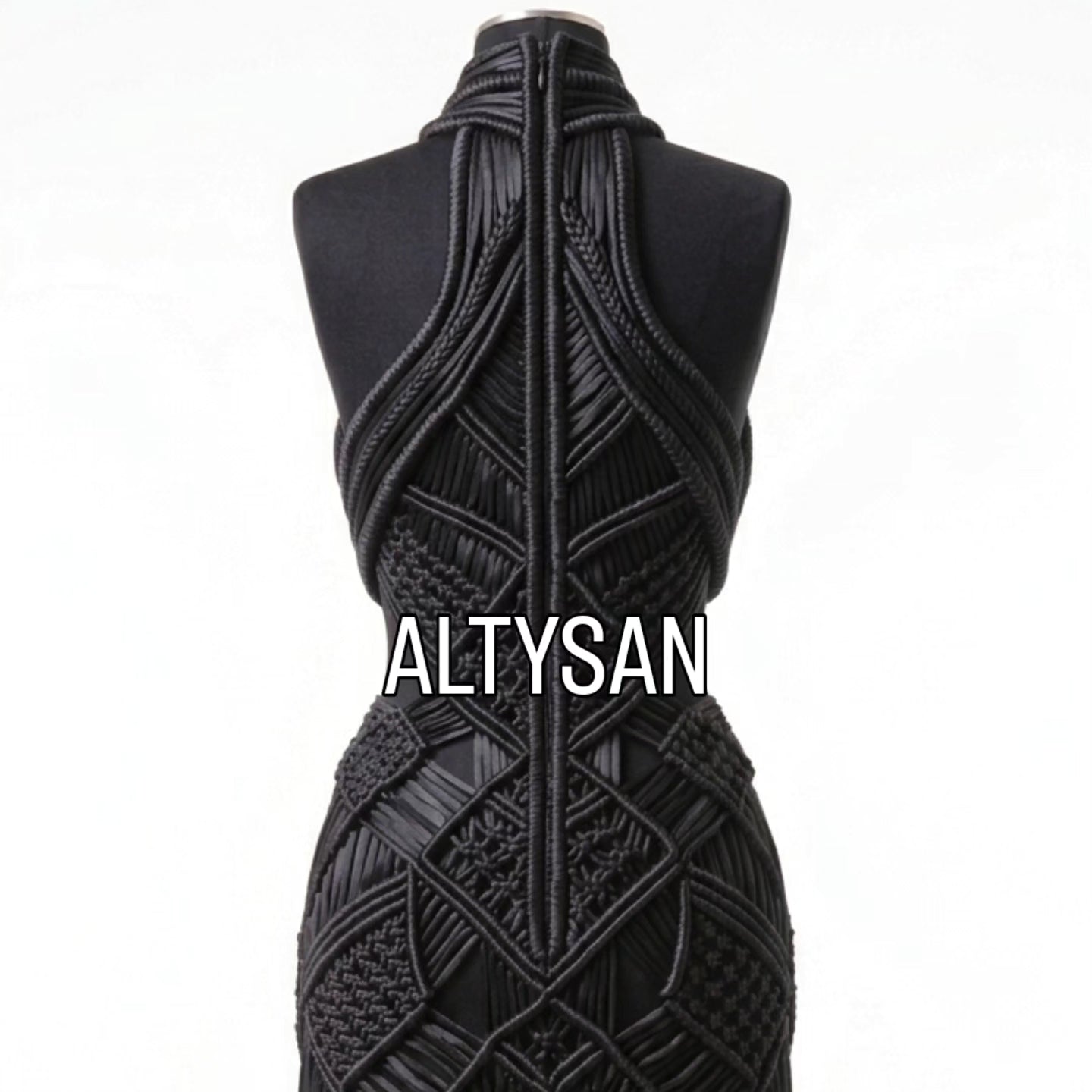 Front view of woven black macrame couture gown on mannequin, ALTYSAN evening dress